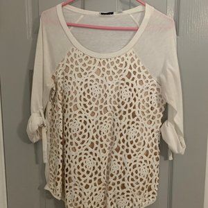 White top with crochet like cutout pattern